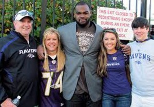 Michael-Oher-and-his-adoptive-family